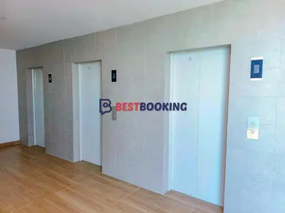 a hallway with a best borrowing sign on a wall at Santa Marina Luxury Stay - Ocean View in Estación El Salto