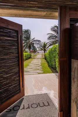 an open door to a house with a driveway at Apartaestudio con Jacuzzi Privado y Vista al Mar in Cartagena de Indias