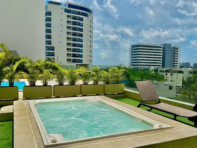 a swimming pool on the roof of a building at Loft Vistas Mar. Crespo Piscina y Jacuzzi in Cartagena de Indias