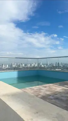 a swimming pool with a view of the city at Alma Kalamari 24 in Cartagena de Indias