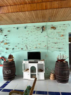 a room with a wall with a map on it at San Bernardo del Viento Cabaña La Isabela in San Bernardo del Viento