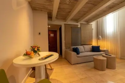 a living room with a couch and a table at APARTAMENTO CON VISTA Al MAR in Cartagena de Indias