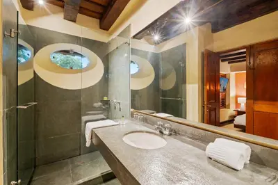 a bathroom with a sink and a mirror at Reve hotel in Cartagena de Indias