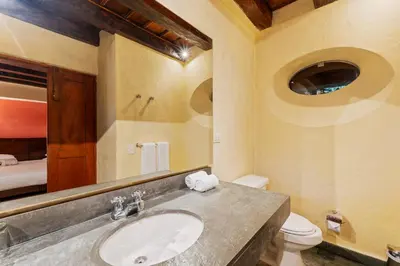 a bathroom with a sink and a toilet at Reve hotel in Cartagena de Indias