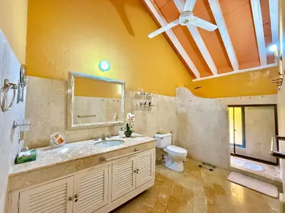 a bathroom with a sink and a toilet at by Calamari Homes - El Porvenir 402 walled city in Cartagena de Indias