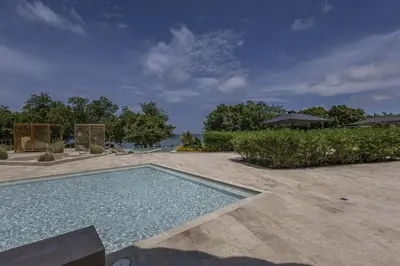a swimming pool in the middle of a patio at 4BR Caribbean Deluxe Villa 3C in Cartagena de Indias