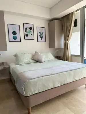 a bedroom with a large bed and a window at Cartagena Beach - Sea View - Airport 5 min in Cartagena de Indias