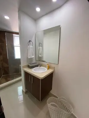 a bathroom with a sink and a mirror at Apartamento en Morros in Cartagena de Indias
