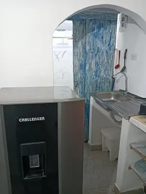 a bathroom with a sink and a counter with a sink at Casamar sol caribe in Cartagena de Indias