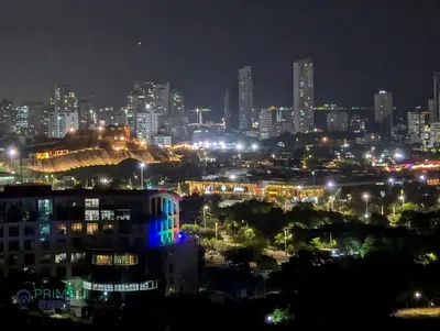 a city lit up at night with lights at Beach Front - Luxury High Rise - Dubai Style in Cartagena de Indias