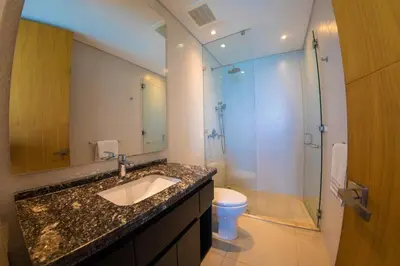 a bathroom with a sink and a shower and a toilet at luxury Aparment Ocean view H2 condominium apto 2105 in Cartagena de Indias
