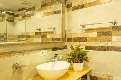 a bathroom with a sink and a mirror at Inca Caribe 302 in Coveñas
