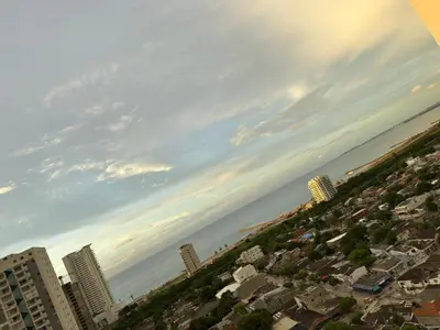 a view of a beach with buildings and the ocean at ÁME Living in Cartagena de Indias