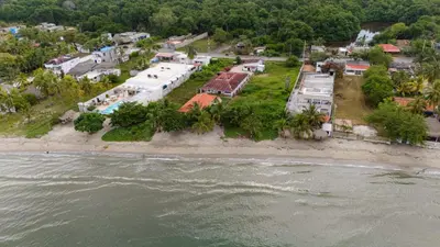 an aerial view of a resort next to the water at Casa La Altamar in Coveñas