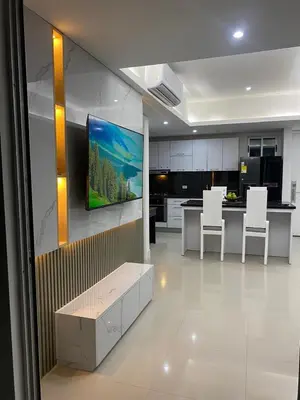 a kitchen with a tv hanging on the wall at Luxury Ocean View - Bocagrande in Cartagena de Indias