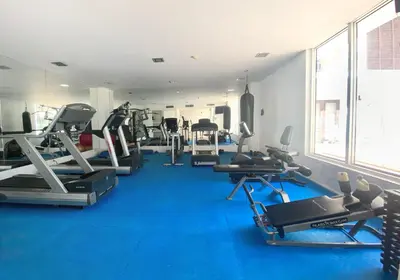 a gym with several treadmills and cardio machines at Apartamento en el centro historico de Cartagena in Cartagena de Indias