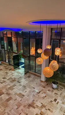 a building with many chandeliers hanging from the ceiling at Cartagena apartamento tipo loft in Cartagena de Indias