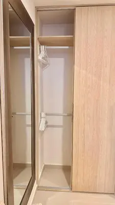 a glass door to a closet with a mirror at Cartagena apartamento tipo loft in Cartagena de Indias