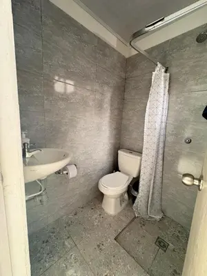 a bathroom with a toilet and a sink at Maru Apartamentos #4 in Cartagena de Indias