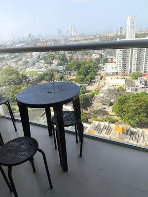 a table and two chairs on a balcony with a view at Cartagena Royal Residences 903 in Cartagena de Indias