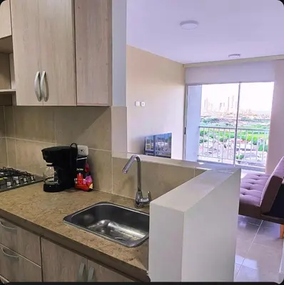 a kitchen with a sink and a counter top at Hermoso apartamento cerca a las playas de Marbella in Cartagena de Indias