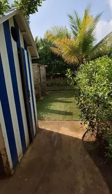 a beach house with a blue and white shed at Cartagena zona norte playa uso exclusivo in Cartagena de Indias