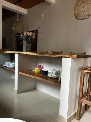 a kitchen with a counter with dishes on it at Isla Rosa Coveñas in Coveñitas