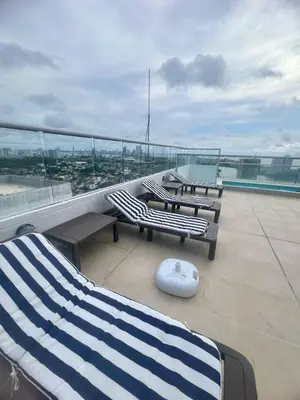 a balcony with two benches and a computer mouse on it at Moderno apartamento con vista al mar en Cartagena in Cartagena de Indias
