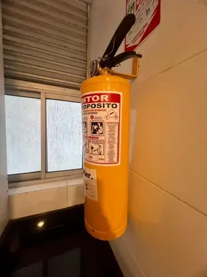 a fire extinguisher is attached to a wall at Moderno apartamento con vista al mar en Cartagena in Cartagena de Indias