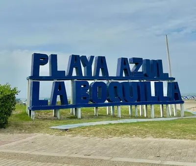 a large blue sign that reads playaaza lallor at Casa de lujo en Condominio Privado por Habitaciones in Cartagena de Indias
