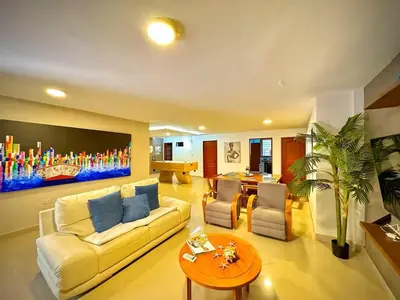 a living room with a couch and a table at Cartagena Vibes House in Cartagena de Indias