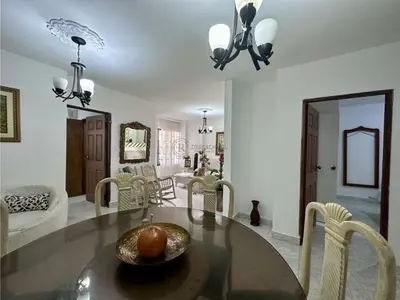 a dining room table with a bowl of fruit on it at Apartamento Pie de la Popa Cartagena - 3 Habitaciones in Cartagena de Indias
