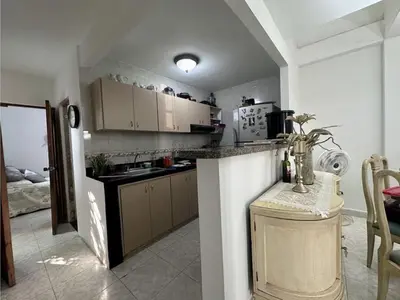 a kitchen with white cabinets and a counter top at Apartamento Pie de la Popa Cartagena - 3 Habitaciones in Cartagena de Indias