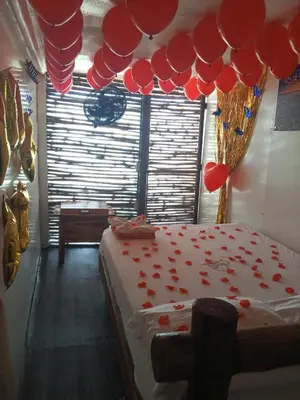 a bedroom with a bed with red hearts on it at Venido del mar III in Playa Blanca