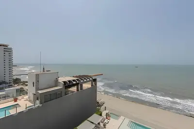 a view of the beach and the ocean from a building at 1004 Morros City - Spectacular 1 Bedroom Condo in Cartagena de Indias
