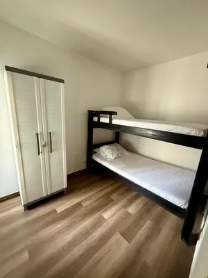 a room with two bunk beds and a closet at Casa Ingrid in Cartagena de Indias