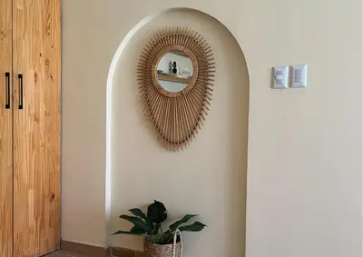 a hallway with a mirror on the wall at Villa CANGGU- Villa con piscina privada, estilo mediterraneo in Tubará