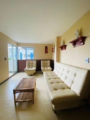 a living room with a couch and two chairs at Apartamento Los Lagos in Cartagena de Indias