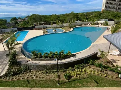 an overhead view of a swimming pool at a resort at VISTA BAHIA Santa Marina Santa Marta in Santa Marta