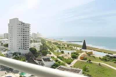 a view of the beach from the balcony of a building at Escape to Paradise - Oceanfront in Cartagena in Cartagena de Indias