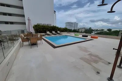 a swimming pool on the roof of a building at Escape to Paradise - Oceanfront in Cartagena in Cartagena de Indias