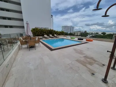 a swimming pool on the roof of a building at Escape to Paradise - Oceanfront in Cartagena in Cartagena de Indias