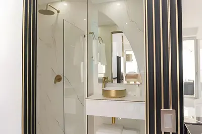 a bathroom with a sink and a mirror at Escape to Paradise - Oceanfront in Cartagena in Cartagena de Indias
