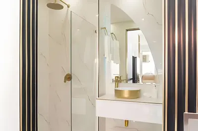 a bathroom with a sink and a mirror at Escape to Paradise - Oceanfront in Cartagena in Cartagena de Indias