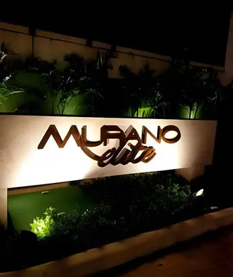 a sign for a marmo club at night at Hermoso Apto - 2 Hab Piso- 17 Murano Elite in Cartagena de Indias