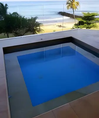 a swimming pool with blue lighting on a house at Hermoso Apto - 2 Hab Piso- 17 Murano Elite in Cartagena de Indias