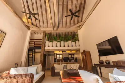 a living room with white furniture and a wooden ceiling at Casa de 3 Hab en la Ciudad Amurallada con Piscina in Cartagena de Indias
