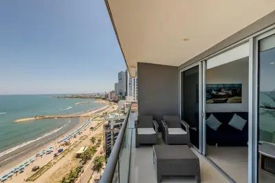 a hotel room with a view of the beach at 1704 Morros City - Espectacular Apto en Bocagrande in Cartagena de Indias
