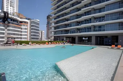 a large swimming pool in front of a building at Espectacular Vista al Mar en Morros City piso 19 in Cartagena de Indias