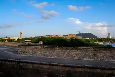 a view of a city from the top of a wall at Relaxing New Apt w/ Balcony in Getsemani! in Cartagena de Indias